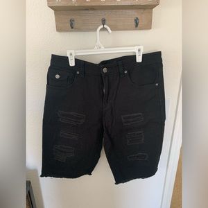 Men’s black distressed shorts